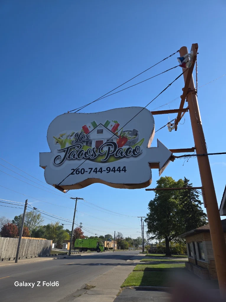 Los Tacos Paco road sign on East Pontiac Street