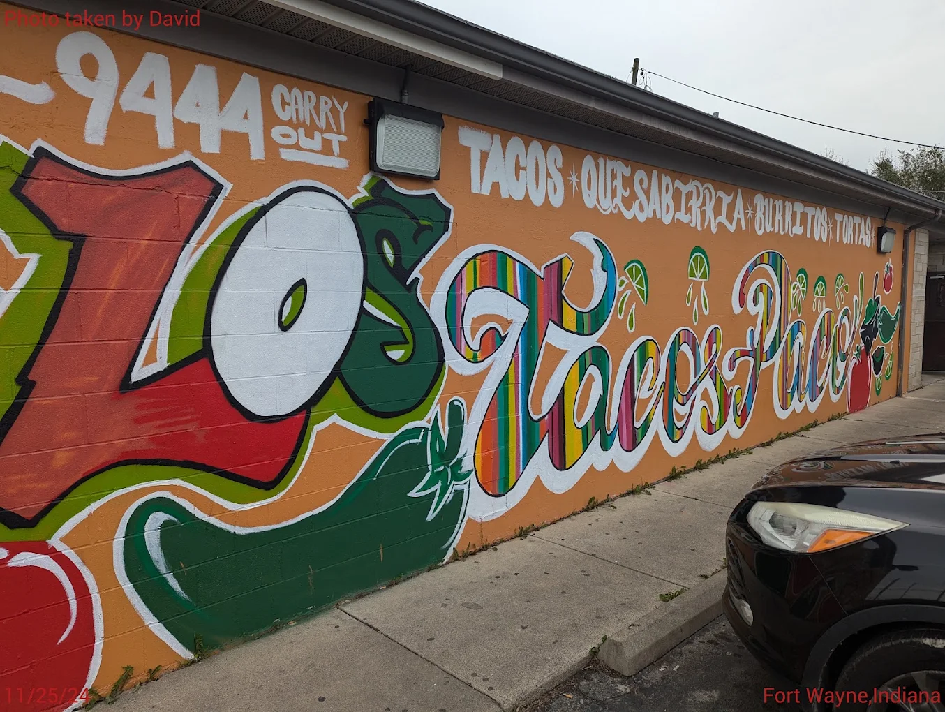 Hand-painted Los Tacos Paco mural on the side of the restaurant in Fort Wayne